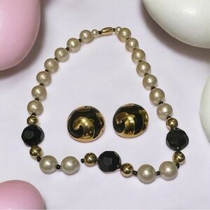 Gold and Black Necklace with Striking Bead Design